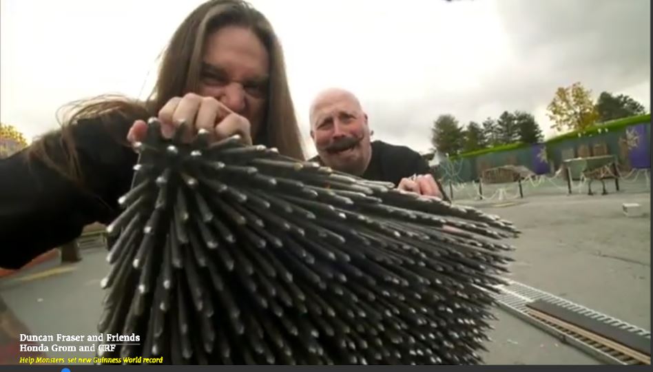 MOTORCYCLES RUN OVER MAN LYING ON A BED OF NAILS and SET NEW GUINNESS WORLD RECORD